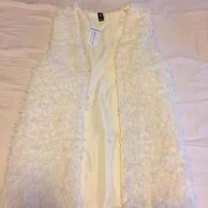 Small white fluffy vest